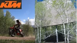 Off road Supermoto drifting and giant metal structure in the woods??