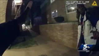 Newly released body camera footage shows suspect pointing gun at OKC police officer