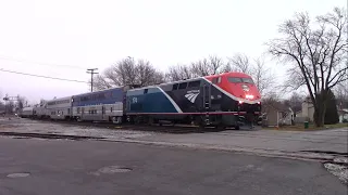 AMTK 51 with AMTK 174 (Newly Painted in Phase VII Scheme), CDTX 6904, and AMTK 72 in Monon, Indiana