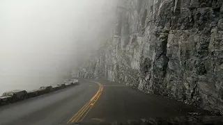 Going-to-the-Sun Road Driving West in Thick Fog Along the Continental Divide Glacier National Park