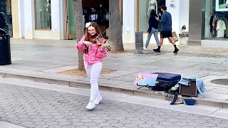 Teen violin street performer in Santa Monica