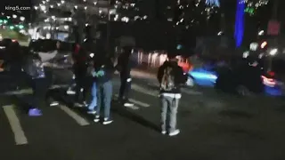 Protesters accuse off-duty Seattle officer of driving through their crowd