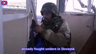 eng subs Givi's 'Somali' battalion flag over the Donetsk airport runway