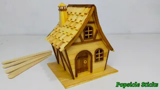 Making fantasy house from popsicle sticks