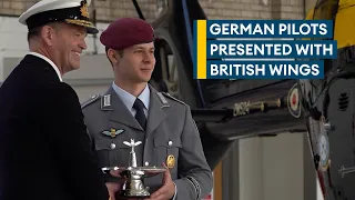 German pilots handed British wings after training at RAF base