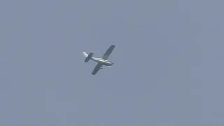 A unusual fast cruising 2 bladed Cessna 182 Skylane flying overhead!