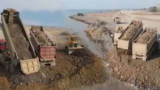 Massive Project Operators Excellent Expertly Dozers and Dump Pushing Soil mixed Stone