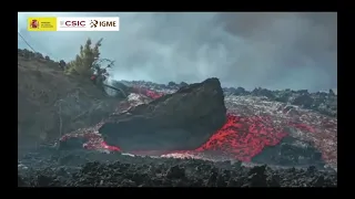 Day 31:  Massive boulder dragged down lava river. La Palma Volcano