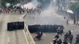 Police in Jakarta disperse labour law protesters