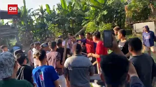 Tangkap Bandar Narkoba, Polisi Lompat Ke Sungai Diserang Warga