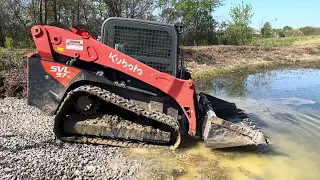 Part 2 of building a livestock rock drinking pad on farm pond.