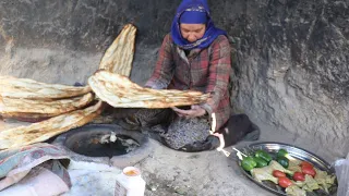 Young mother in the cave cooking Traditional Tandoori Chicken | Afghanistan Village Life