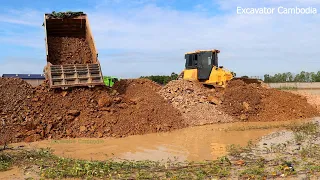 Epic 7 Good Team Working Dump Truck Dumping Soil Stone Back Fill And Dozer Moving In To Water