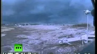 Japan earthquake_ CCTV video of tsunami wave hitting airport www.bwithyou.com