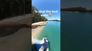 STEALING BOAT WAKE WITH A TRACTOR?! #shorts #shortsvideo #wakesurfing #wakesurf #skimboarding