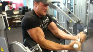 Racking the Hoist curl machine for 12 reps. (200 lbs)