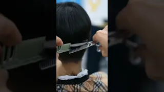 Indonesian girl get man haircut at barbershop