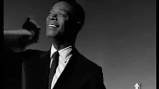 Nat King Cole sings "When I Fall in Love"