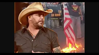 Protesters Burn American Flag Outside Jason Aldean’s Show: ‘We’ll Try It At Your Concert’ 🔥🇺🇸