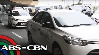 'Dahil sa pang-aapi' - Regular taxis bawal muna sa NAIA Terminal 1 | TV Patrol