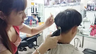 Professional men's haircut service at Vietnamese barbershop