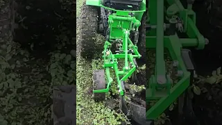 plowing with a homemade mini tractor