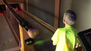 Perfect Game! Boy, 8, rolls 300 in duckpin bolwing