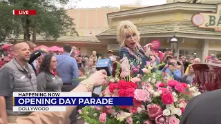 Dolly Parton says hello during opening day parade at Dollywood