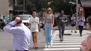 Toni Garrn and a friend walk in the streets of New York