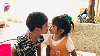 Two brothers give a sweet kiss 💋 funny baby