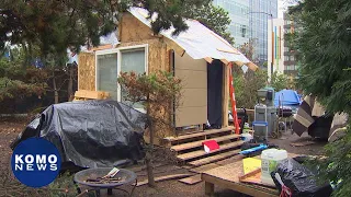 Homeless people are building a house in the median of I-5 on-ramp