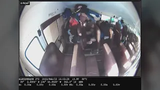 Video: Car crashes into Albuquerque school bus with students inside