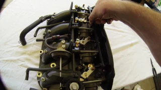 Honda 4 stroke boat motor BF90 Carbi removal and clean.