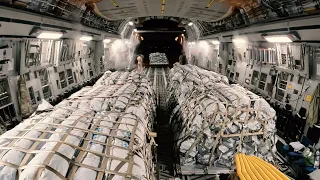 Timelapse - Loading pallets of humanitarian tents into a Strategic Airlift Capability C-17 aircraft