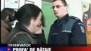Romanian Police Officer Slaps Teacher