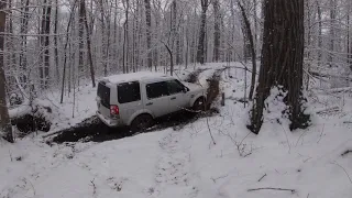 LR4 on trail in the Snow