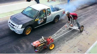 WHOS MORE POWERFUL ? - Kubota FARM TRACTOR owned MITSUBISHI PICKUP TRUCK in Drag Racing !!!