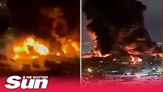 Moment explosions are seen as huge fire breaks out in Moscow shopping centre