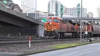 (Northbound) BNSF Grain Train slowly passes through 21ST Street and stops.