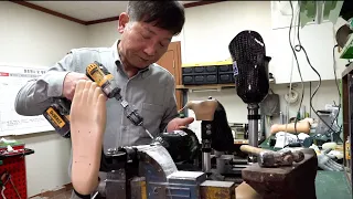 Process of making comfortable prosthetic leg for disabled person. Korean prosthetic limb artisan