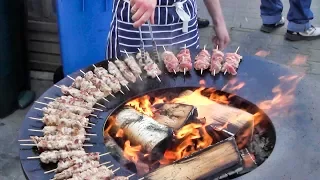 Huge Strange Grill with Pork and Chicken Skewers. Street Food in Minsk, Belarus