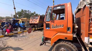 Dangerous Situation Tractor Stuck On Railgate : Furious Speedy Train Moving at Railroad crossing