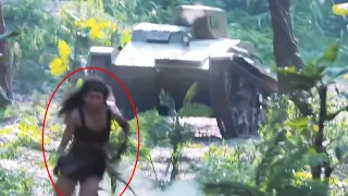 日軍開坦克追擊女獵人，卻不料女獵人從樹上飛撲坦克，把炸彈往坦克駕駛艙裡塞！