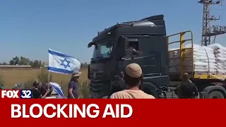 Protesters attempt to block humanitarian aid to Gaza