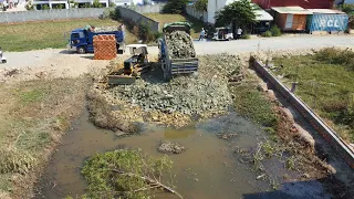 Start a new project! Technique Mitsubishi dozer Push Rock Stone Into Water With Stone Dump Trucks