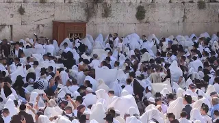 Jewish worshippers gather at Jerusalem's Wailing Wall for traditional priestly blessing