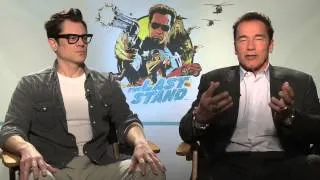 Arnold Schwarzenegger and Johnny Knoxville talk gun control and 'The Last Stand' with Andrew Freund