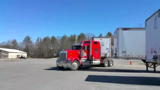 Matt alley docking a 53 foot trailer onto a dock with a Kenworth Icon 900
