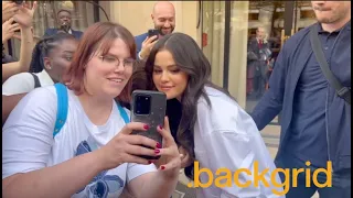 Selena's Parisian Dream:  Selfie with fans outside her hotel in Paris