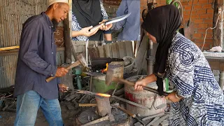 ROSETH'S WIFE HELPS HIM TO FORGE A KNIFE FOR THE KITCHEN